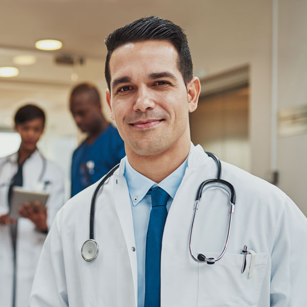 Friendly confident hispanic doctor HAT9WKS